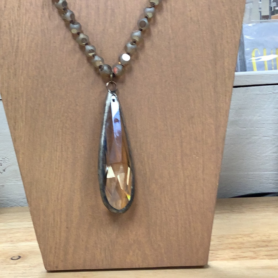 Gray beads w/ long amber crystal